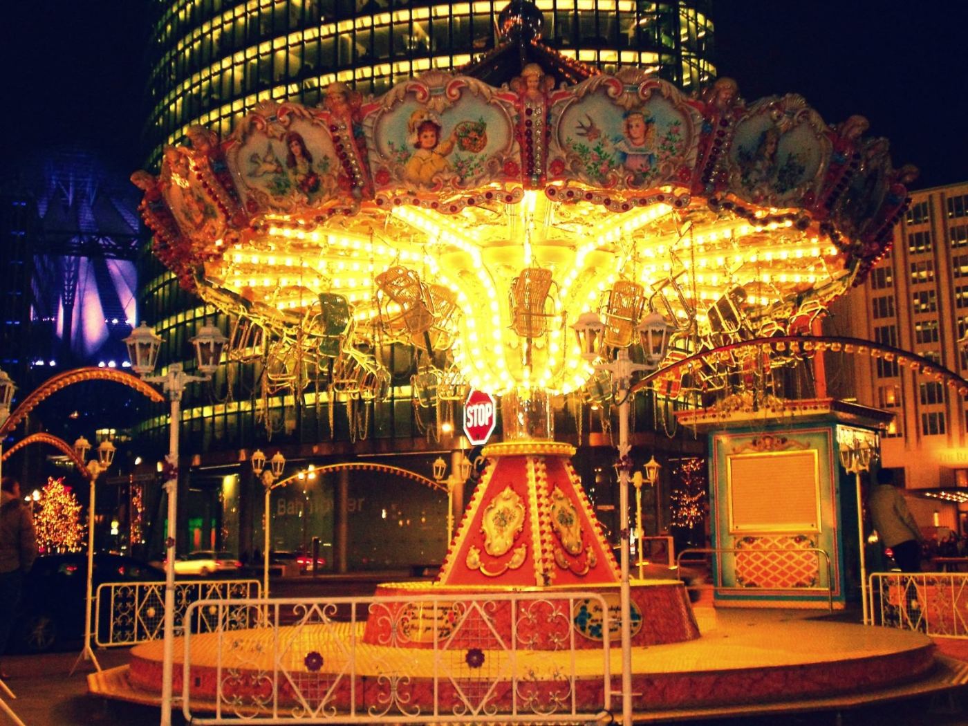 a carousel, still turning at midnight.