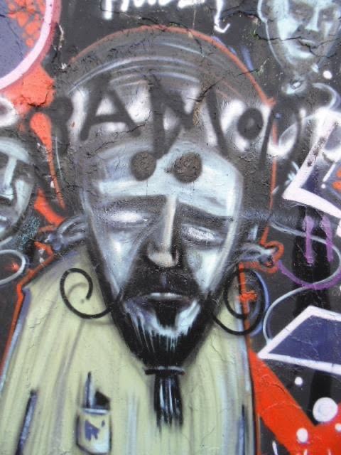 AMOUR, over a face nobody signed.