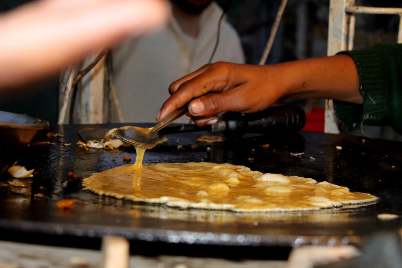 hands over the griddle. nobody measures anything.