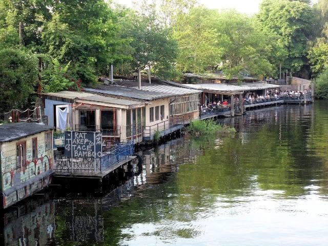 houseboats strung along the canal, one serving food off a chalkboard. the last summer you could live on that water for nothing.