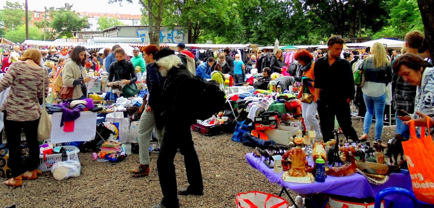 flohmarkt. other people’s lives, laid on blankets, three euros each.