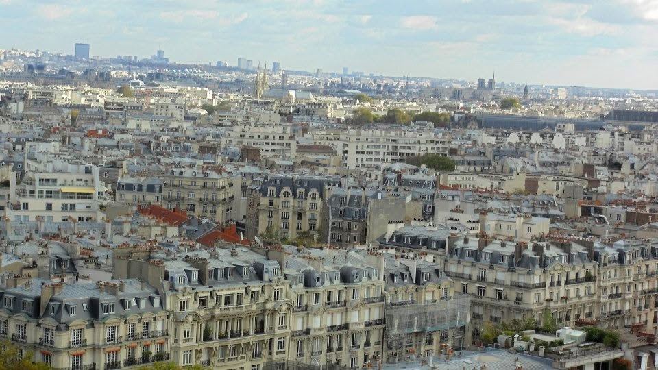 paris rooftops, deliberately unromantic.